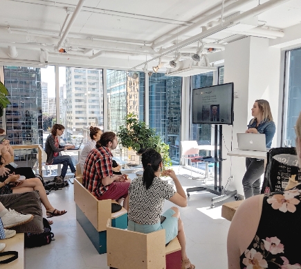 A group receives training at a workshop