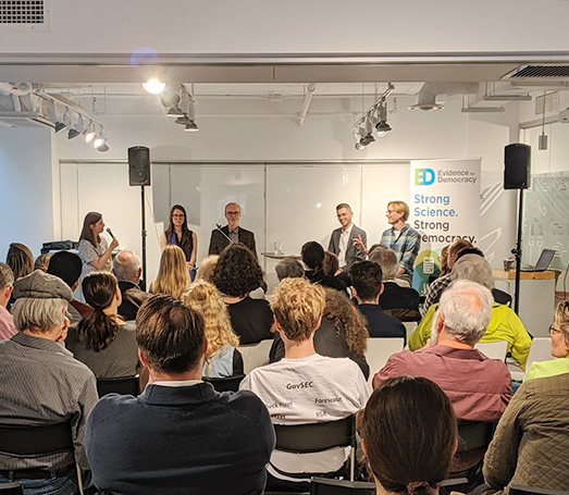 Participants attend an E4D panel